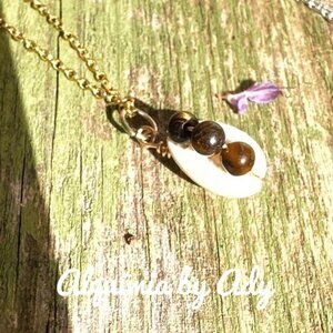 Shell and tigeres eye jeweled necklace